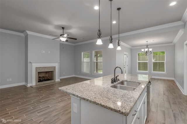 345 Coppice Pl, Bossier City, LA 71111 - kitchen with a sink, wood finished floors, baseboards, stainless steel dishwasher, and recessed lighting