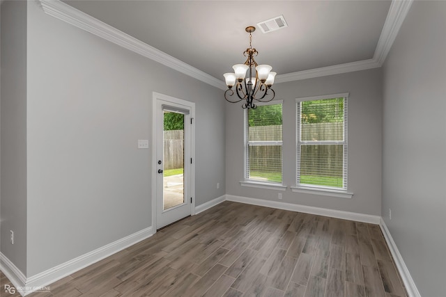 345 Coppice Pl, Bossier City, LA 71111 - unfurnished dining area featuring a chandelier, wood finished floors, crown molding, and baseboards
