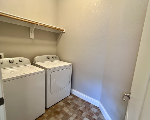 11040 Kinston St, Fort Worth, TX 76179 - washroom with washer and dryer and baseboards