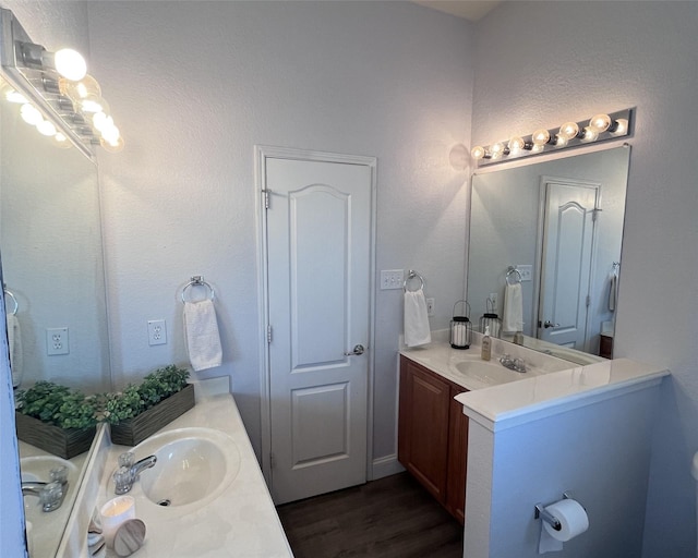 11040 Kinston St, Fort Worth, TX 76179 - bathroom with two vanities and wood finished floors