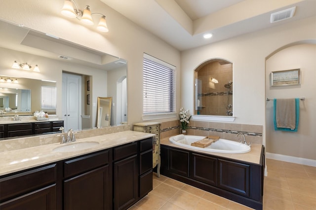 102 Autumn Sage Dr, Wylie, TX 75098 - bathroom with plenty of natural light, tile patterned flooring, a bath, a tile shower, and recessed lighting