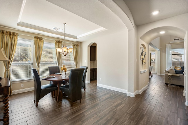 102 Autumn Sage Dr, Wylie, TX 75098 - dining area with a chandelier, dark wood-type flooring, baseboards, arched walkways, and recessed lighting
