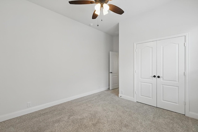 300 Navo Rd, Little Elm, TX 75068 - unfurnished bedroom featuring carpet flooring, a closet, baseboards, and ceiling fan