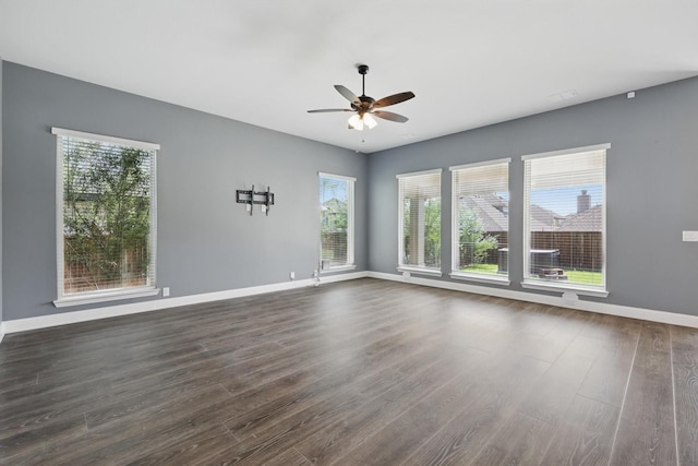 300 Navo Rd, Little Elm, TX 75068 - spare room with a ceiling fan, healthy amount of natural light, and dark wood-style floors