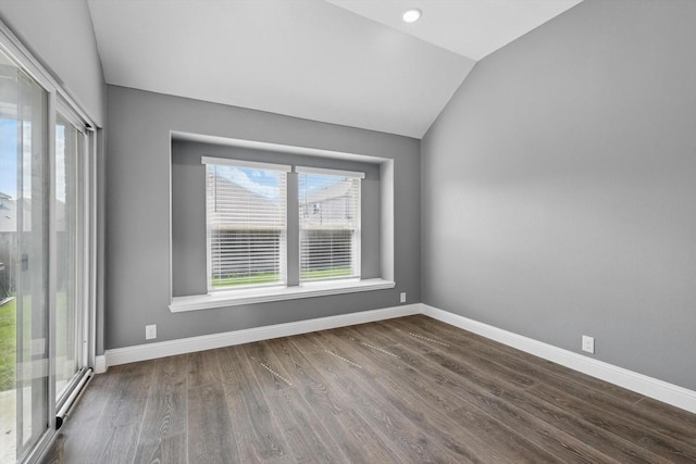 300 Navo Rd, Little Elm, TX 75068 - spare room featuring lofted ceiling, baseboards, and wood finished floors