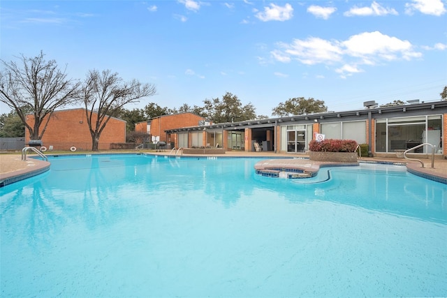 534 E Ave J Unit A, Grand Prairie, TX 75050 - view of pool featuring a pool with connected hot tub