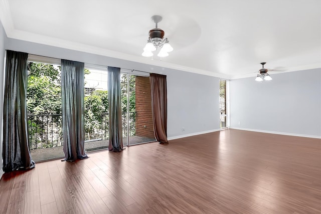 534 E Ave J Unit A, Grand Prairie, TX 75050 - empty room featuring a ceiling fan, wood finished floors, baseboards, and crown molding