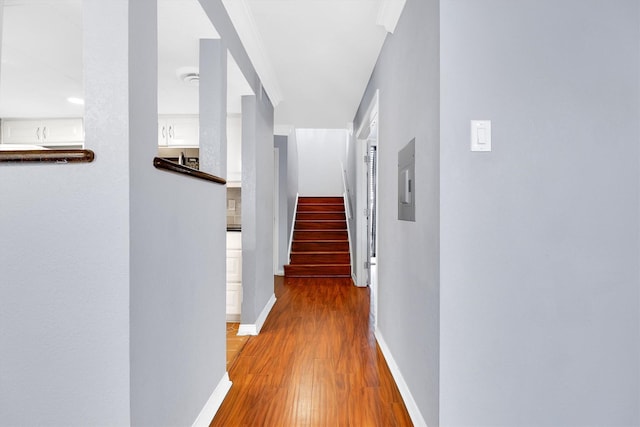 534 E Ave J Unit A, Grand Prairie, TX 75050 - hallway featuring wood finished floors, stairway, and baseboards