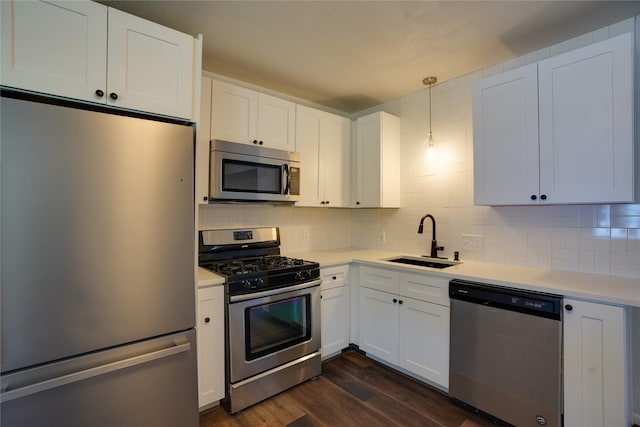 8113 Tumbleweed Trl, White Settlement, TX 76108 - kitchen with appliances with stainless steel finishes, a sink, decorative backsplash, and light countertops