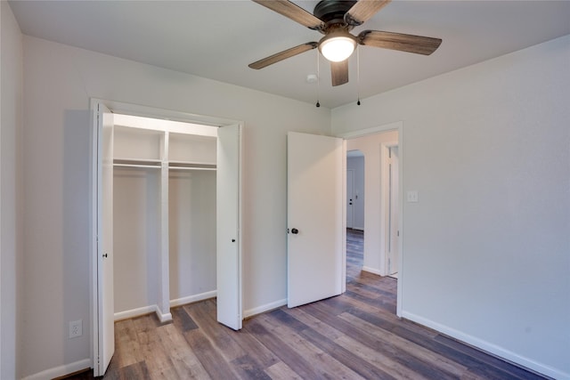 8113 Tumbleweed Trl, White Settlement, TX 76108 - unfurnished bedroom with wood finished floors, baseboards, a closet, and ceiling fan