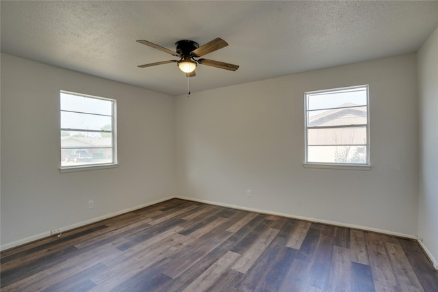 8113 Tumbleweed Trl, White Settlement, TX 76108 - empty room with dark wood-style flooring, a ceiling fan, baseboards, and a textured ceiling