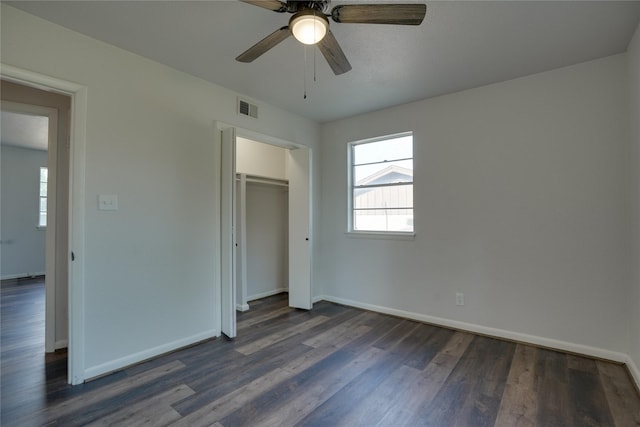 8113 Tumbleweed Trl, White Settlement, TX 76108 - unfurnished bedroom featuring dark wood-type flooring, baseboards, a closet, and ceiling fan