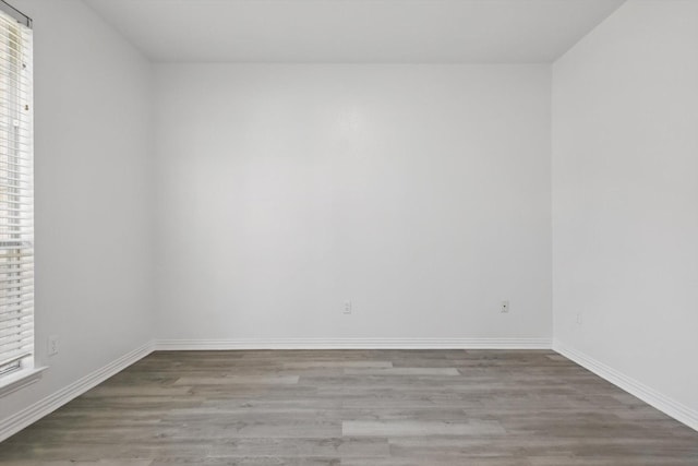 1228 Carriage Creek Dr, Desoto, TX 75115 - unfurnished room with wood finished floors and baseboards