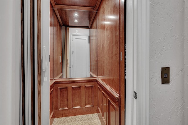 3026 Briarwood Ln, Frisco, TX 75034 - elevator with a textured wall, ornamental molding, and a decorative wall
