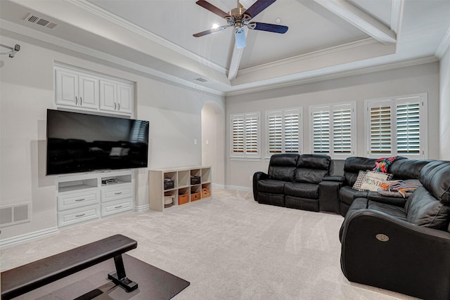 3026 Briarwood Ln, Frisco, TX 75034 - living room featuring crown molding, ceiling fan, carpet flooring, arched walkways, and a raised ceiling