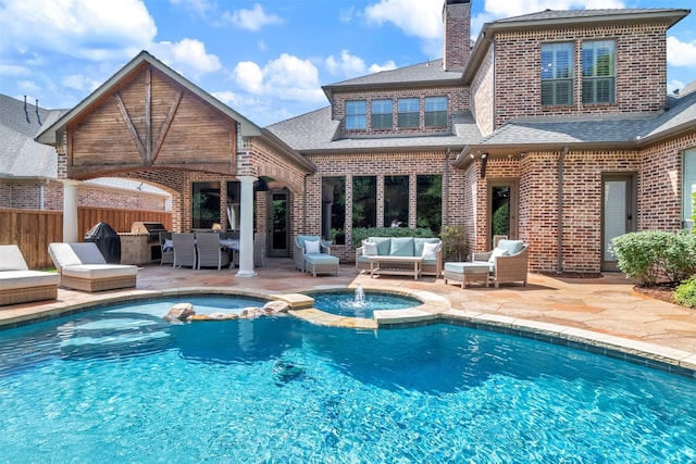 3026 Briarwood Ln, Frisco, TX 75034 - rear view of house featuring an outdoor living space, brick siding, roof with shingles, a chimney, and a patio