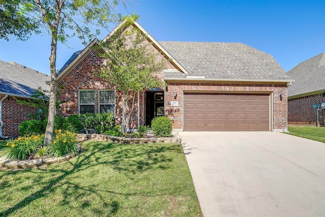 5232 Buffalo Gap Trl, Fort Worth, TX 76126 - view of front of property with brick siding, an attached garage, a front yard, and concrete driveway