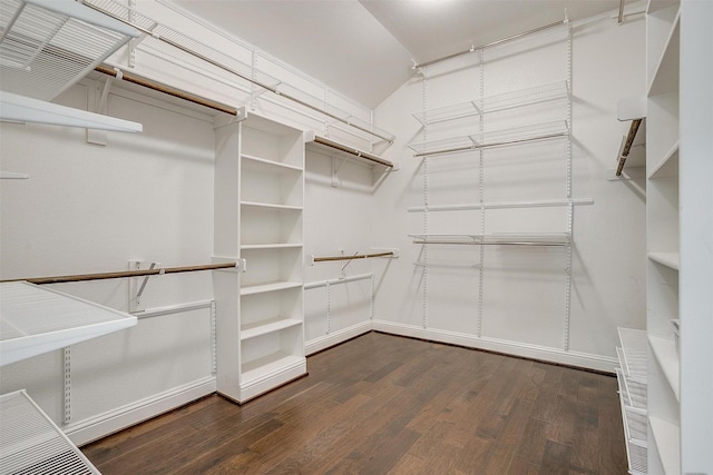 5232 Buffalo Gap Trl, Fort Worth, TX 76126 - spacious closet featuring dark wood-style floors and vaulted ceiling