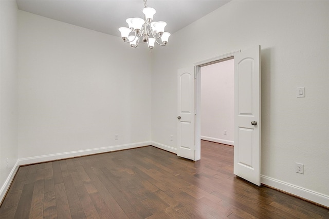 5232 Buffalo Gap Trl, Fort Worth, TX 76126 - unfurnished room with a chandelier, dark wood-type flooring, and baseboards