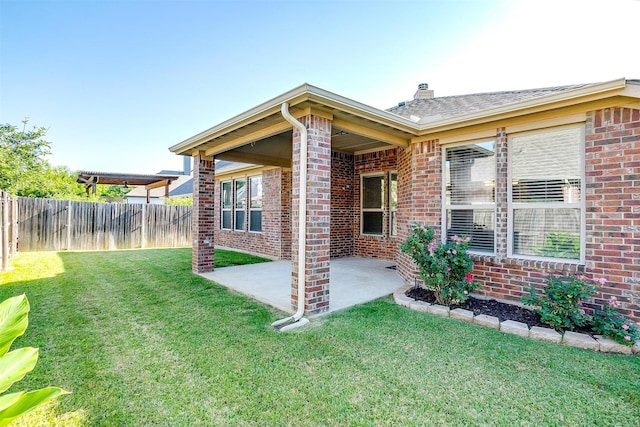 5232 Buffalo Gap Trl, Fort Worth, TX 76126 - rear view of house with brick siding, a patio area, and a chimney