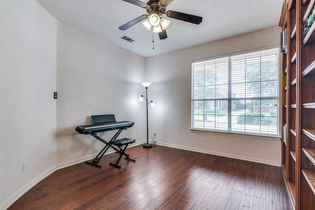 2001 Longfellow Ln, Flower Mound, TX 75028 - miscellaneous room with baseboards, a ceiling fan, and dark wood finished floors