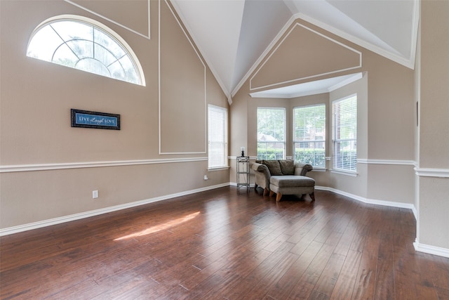 2001 Longfellow Ln, Flower Mound, TX 75028 - living area with wood finished floors, baseboards, and high vaulted ceiling