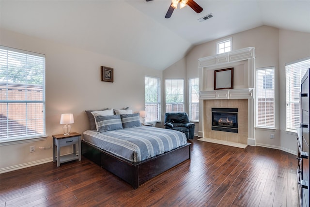 2001 Longfellow Ln, Flower Mound, TX 75028 - bedroom with hardwood / wood-style floors, lofted ceiling, a fireplace, baseboards, and ceiling fan