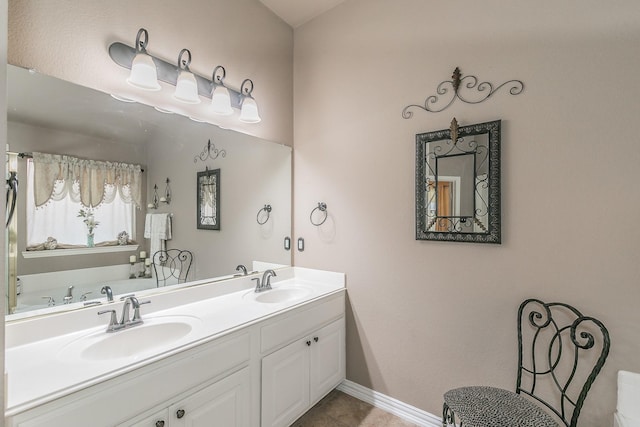 4820 Rum St, Fort Worth, TX 76244 - bathroom featuring double vanity, baseboards, and tile patterned flooring