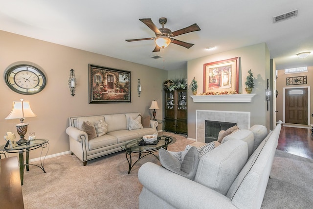 4820 Rum St, Fort Worth, TX 76244 - living area with ceiling fan, a tiled fireplace, carpet, and baseboards