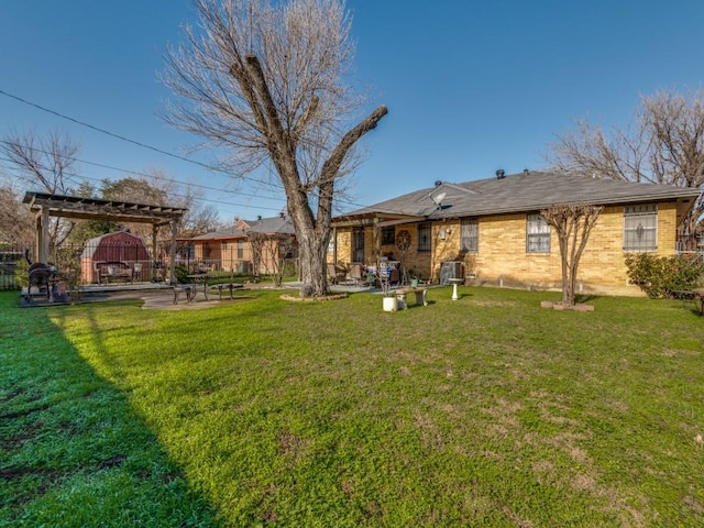 6802 Seco Blvd, Dallas, TX 75217 - rear view of house with a patio and brick siding
