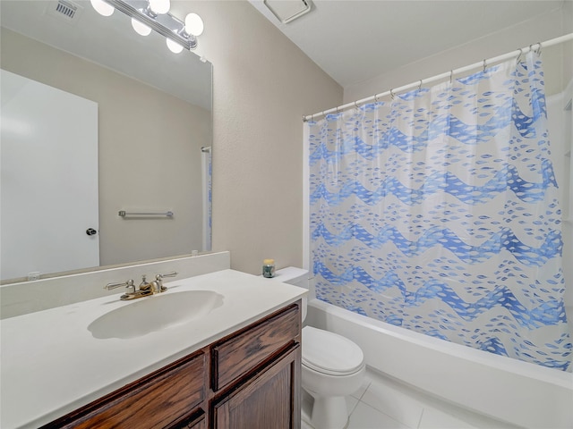 full bathroom with toilet, vanity, tile patterned flooring, and shower / tub combo with curtain