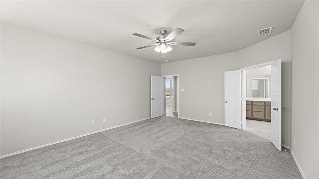 1700 Elle Ln, Aubrey, TX 76227 - unfurnished bedroom with carpet, baseboards, ensuite bath, and ceiling fan