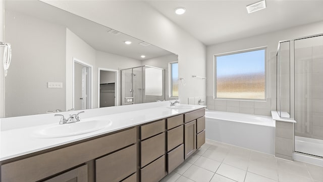 1700 Elle Ln, Aubrey, TX 76227 - bathroom featuring a shower stall, double vanity, a bath, tile patterned flooring, and recessed lighting