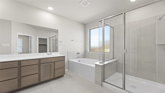 1700 Elle Ln, Aubrey, TX 76227 - full bathroom featuring a shower stall, a garden tub, tile patterned floors, vanity, and recessed lighting