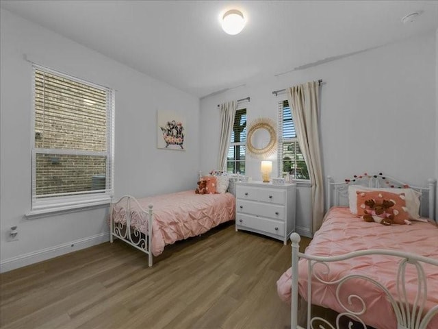 3605 Keechi Creek Dr, Celina, TX 75078 - bedroom with wood finished floors and baseboards