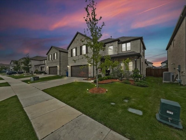 3605 Keechi Creek Dr, Celina, TX 75078 - view of front of home featuring an attached garage, concrete driveway, central air condition unit, and a residential view