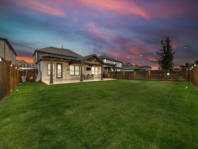 3605 Keechi Creek Dr, Celina, TX 75078 - back of property at dusk featuring a patio area