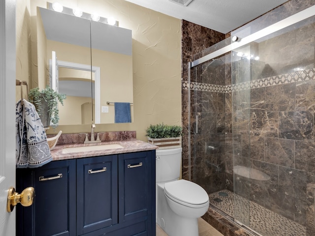 1217 Mandeville Dr, Murphy, TX 75094 - bathroom featuring toilet, a stall shower, and vanity