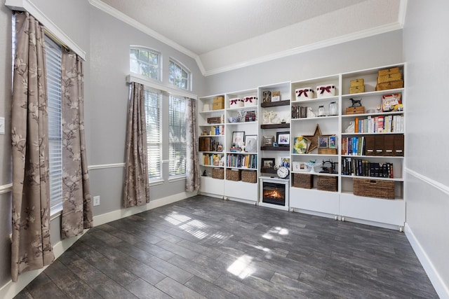 7601 Silverthorn, Rowlett, TX 75089 - unfurnished room with crown molding, vaulted ceiling, plenty of natural light, dark wood-type flooring, and baseboards