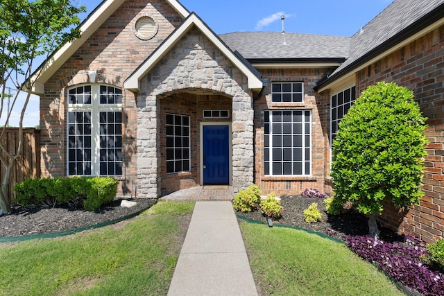 7601 Silverthorn, Rowlett, TX 75089 - entrance to property with brick siding and roof with shingles
