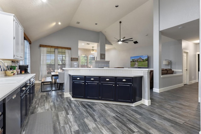 7601 Silverthorn, Rowlett, TX 75089 - kitchen featuring dishwasher, ceiling fan, a sink, light countertops, and white cabinetry