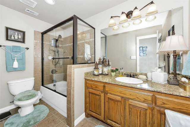 2401 Portwood Way, Fort Worth, TX 76179 - full bathroom featuring vanity, tile patterned flooring, toilet, shower / bath combination with glass door, and baseboards