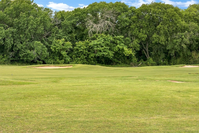 2401 Portwood Way, Fort Worth, TX 76179 - view of property's community featuring view of golf course, a lawn, and view of wooded area