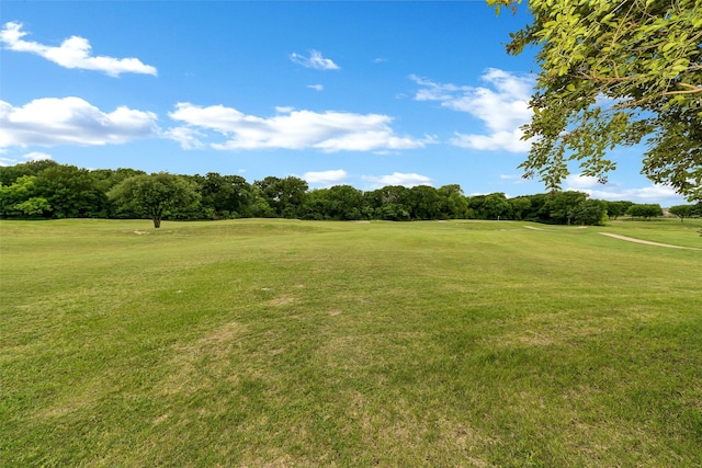2401 Portwood Way, Fort Worth, TX 76179 - view of green lawn with golf course view and view of wooded area