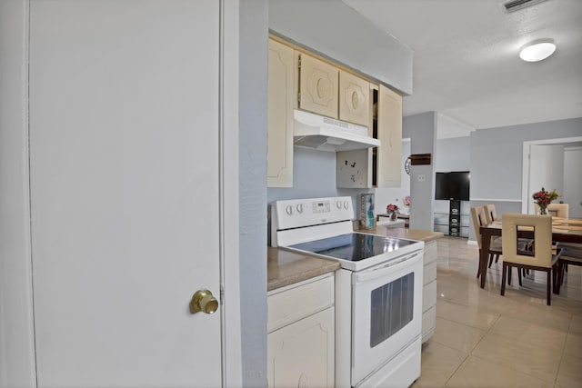 400 E Williamsburg Mnr, Arlington, TX 76014 - kitchen with electric range, under cabinet range hood, light countertops, and light tile patterned flooring