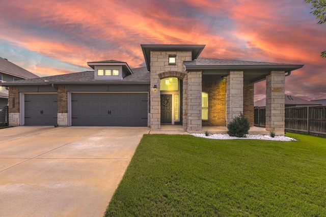 3101 Gilchrist Dr, Waco, TX 76655 - view of front of home with stone siding, a garage, driveway, and roof with shingles