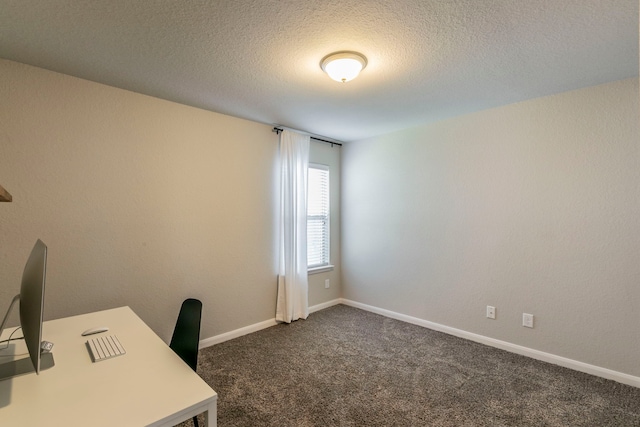 3101 Gilchrist Dr, Waco, TX 76655 - unfurnished office featuring dark carpet, a textured ceiling, and baseboards