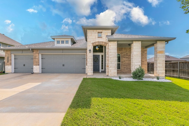 3101 Gilchrist Dr, Waco, TX 76655 - view of front of home featuring concrete driveway, an attached garage, stone siding, and roof with shingles