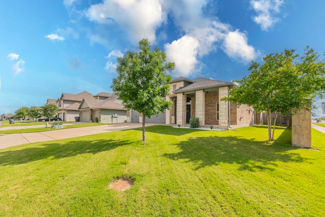 3101 Gilchrist Dr, Waco, TX 76655 - view of front facade with concrete driveway, a front lawn, a residential view, and an attached garage
