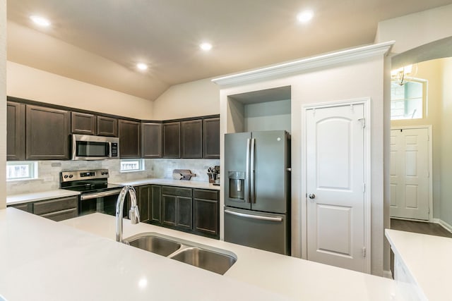 3101 Gilchrist Dr, Waco, TX 76655 - kitchen with stainless steel appliances, a sink, light countertops, backsplash, and recessed lighting